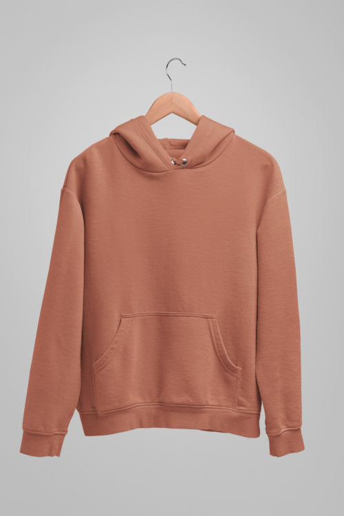 buy now - A Coral Crush Solid Hoodie displayed on a wooden hanger against a plain gray background showcases its rust color, zero-pocket front, hood, long sleeves, and simple, relaxed design. - by unflatter